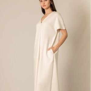 P CILL SIZE S ELEGANT CREAM MAXI DREES.